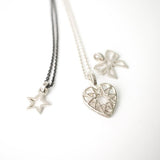 Small Silver Heart Pendant on necklace